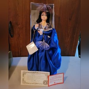 VINTAGE PORCELAIN DOLL
